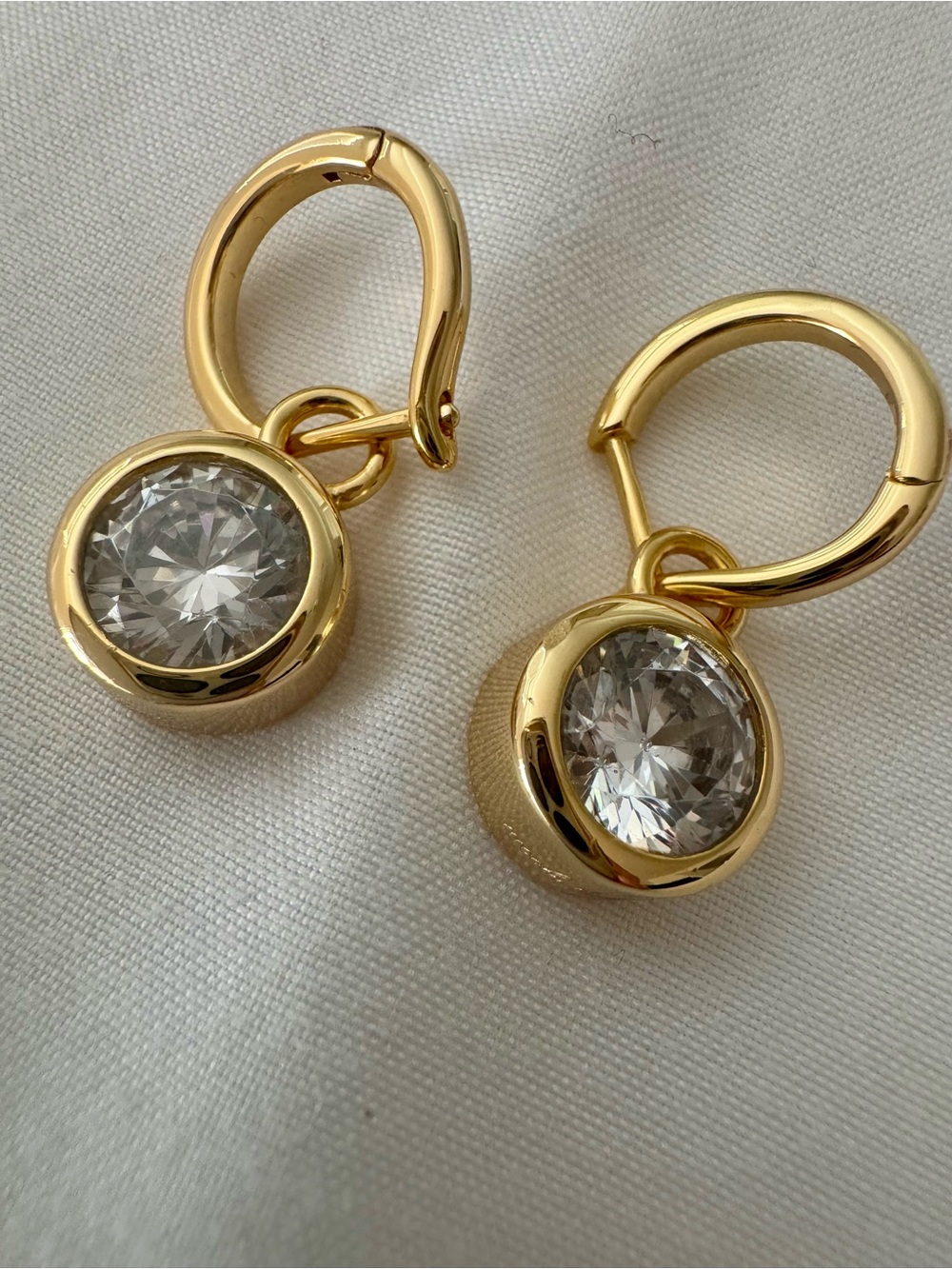Nicola Bathie โThe Indiaโ Gold and Clear Crystal Drop Huggie Earrings